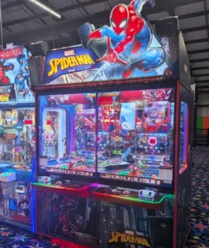 Marvel Spider-Man pusher Arcade Marvel Spider-Man pusher arcade machine with collectible cardsat Players Fun Zone in Westminster, MD